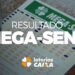 Cartão de aposta da Mega-Sena com resultado impresso e logo da Caixa Econômica.