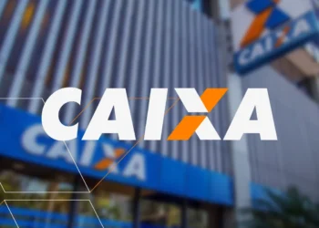 Fachada de agência da Caixa com logotipo em destaque.