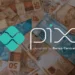 PIX do Banco Central com dinheiro em notas de real, representando a transferência digital no Brasil.
