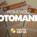 Cartelas de aposta da Lotomania com logo das Loterias Caixa em destaque