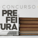 Imagem ilustrativa de um laptop ao lado de uma pilha de livros com o texto "Concurso Prefeitura", representando estudo e inscrições online para concurso público municipal.