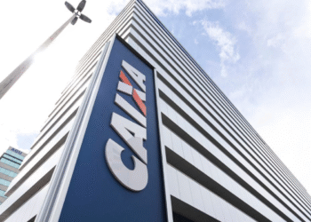 Prédio moderno da Caixa Econômica Federal com fachada azul e logo em destaque