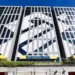 Edifício do Banco do Brasil, com design moderno e gráfico, representando a sede da instituição em contexto de concurso público.