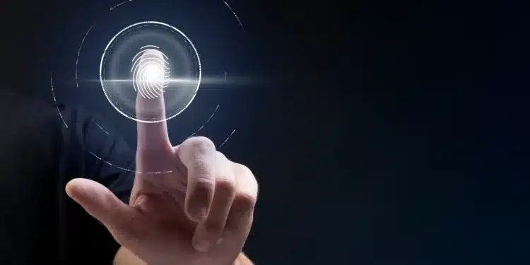 Leitor digital com autenticação por biometria, representando a confirmação necessária para pagamentos do INSS