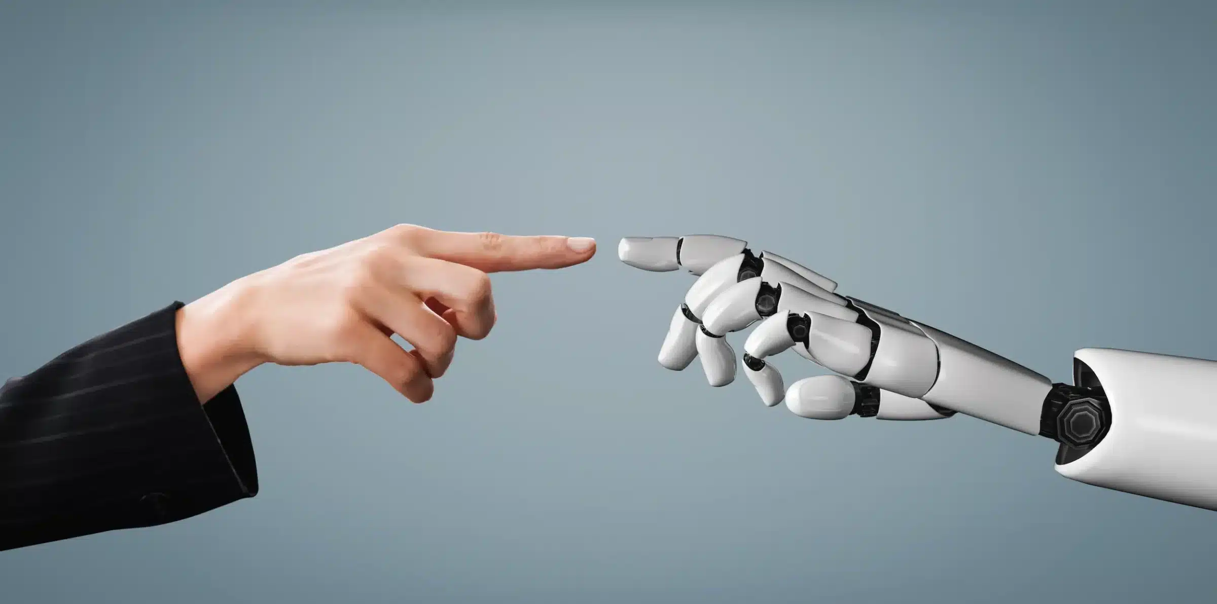 Mão humana e mão robótica se tocando, simbolizando a união entre habilidades humanas e inteligência artificial no setor tecnológico.