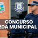 Agente fardado da guarda municipal observa atento em frente ao prédio oficial
